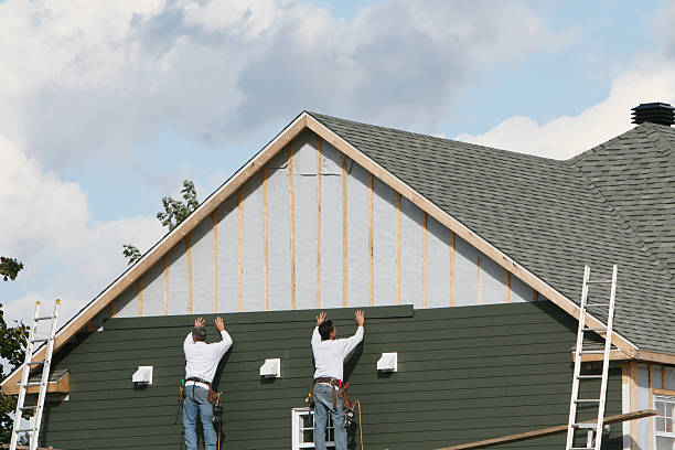 Professional Siding technician working in Ronda, NC